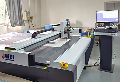 Warp and weft cutting machine